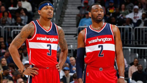 John Wall and teammate prepare for game during NBA match, HD Desktop Wallpaper