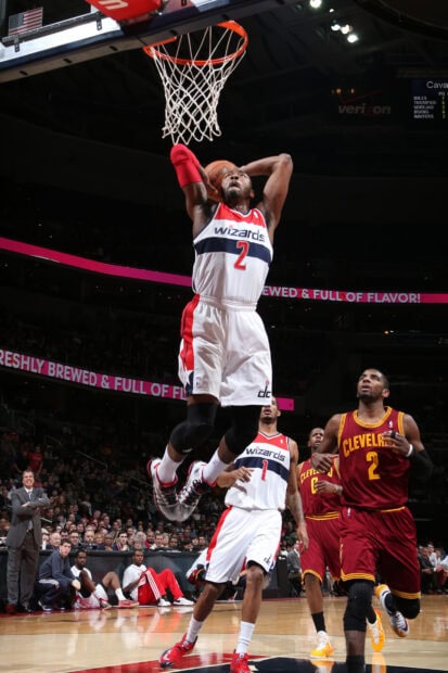John Wall Wallpapers shows a basketball player jumping near the hoop, HD Mobile Wallpaper