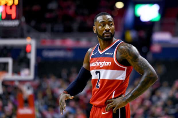 John Wall in a red and white Washington jersey on the basketball court, 2K Desktop Wallpaper