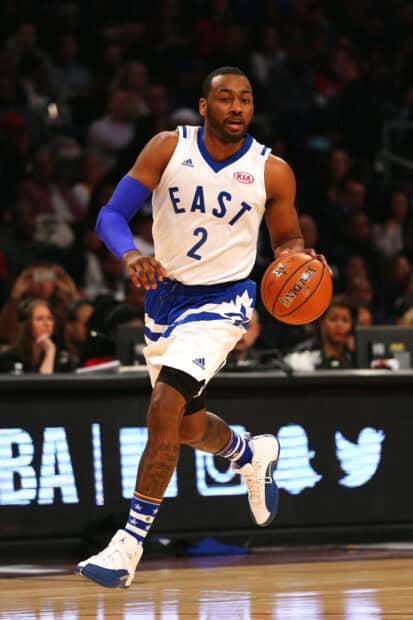 John Wall dribbling the ball during an intense basketball game, HD Mobile Wallpaper