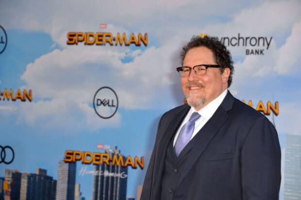 Jon Favreau is attending a Spider Man Homecoming premiere smiling in a dark suit, HD Desktop Wallpaper