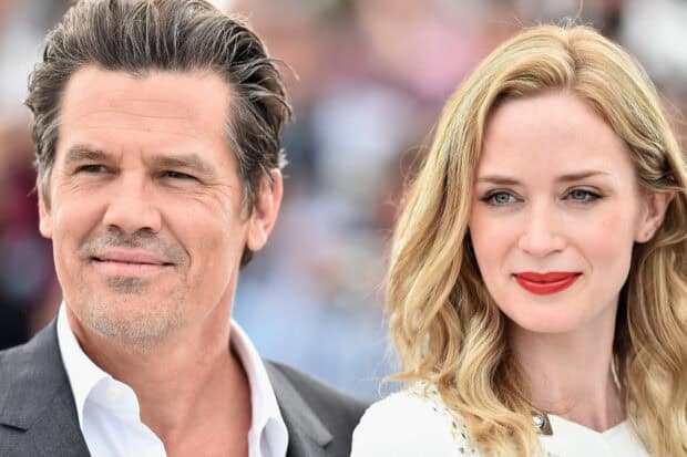 Josh Brolin stands next to Erin Moriarty at a public event with a blurred background, HD Desktop Wallpaper