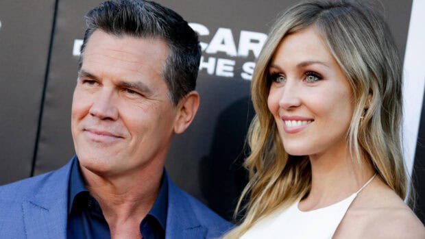 Josh Brolin with a smiling woman at an event posing for photos, HD Desktop Wallpaper