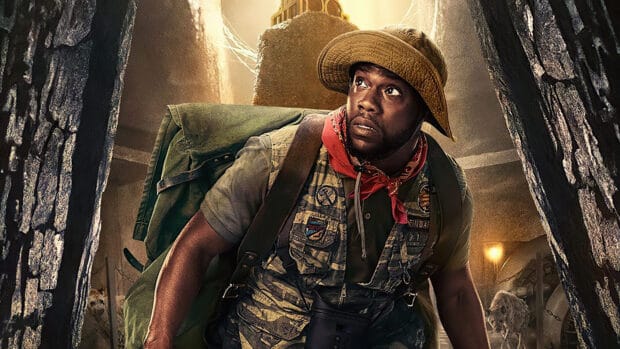 A man dressed in explorer gear cautiously looks upward in a jungle environment from Jumanji The Next Level Wallpapers, 4K Desktop Wallpaper