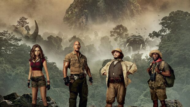 The Jumanji The Next Level characters stand in a jungle with wild animals and mist, 4K Desktop Wallpaper