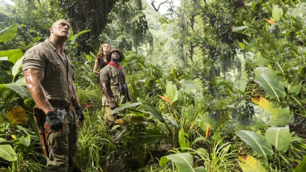 Three characters explore the dense jungle in Jumanji The Next Level, HD Desktop Wallpaper