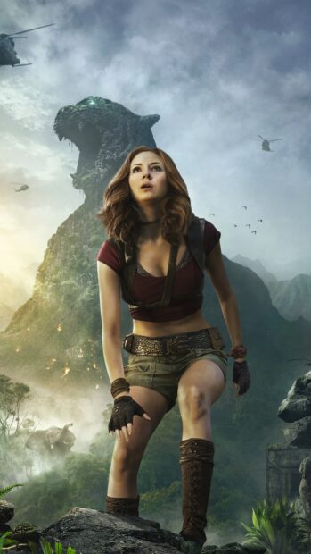 A woman crouches in front of a giant stone jaguar with helicopters flying overhead in Jumanji The Next Level, 4K Mobile Wallpaper