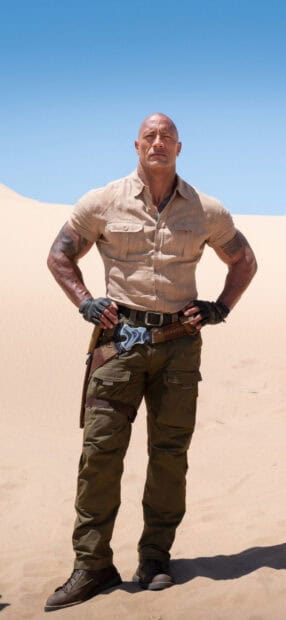A muscular man stands confidently in the desert from Jumanji The Next Level, HD Phone Wallpaper