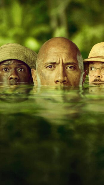 The Jumanji The Next Level characters are partially submerged in water with a green forest background, HD Phone Wallpaper