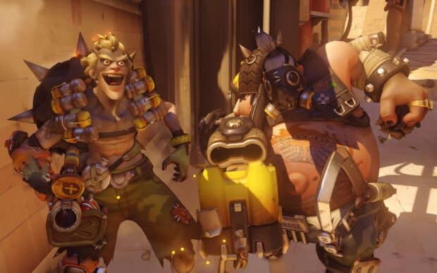 Junkrat and Roadhog are preparing for battle in a desert setting, HD Desktop Wallpaper