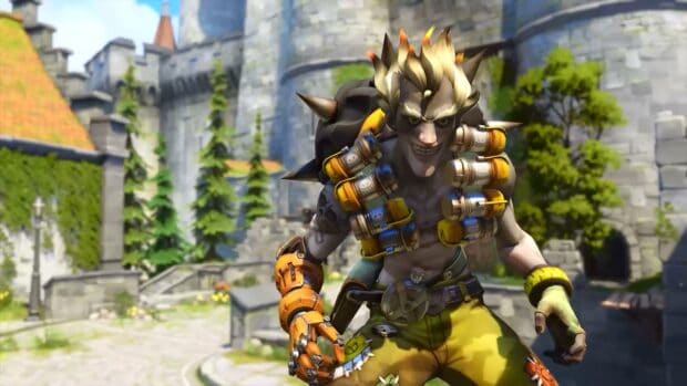 Junkrat stands in a castle courtyard with explosives strapped to his body, HD Desktop Wallpaper
