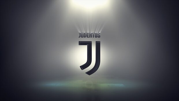 The Juventus Football Club logo is highlighted with a glowing effect in a dark setting, HD Desktop Wallpaper