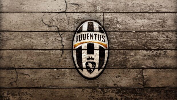 The Juventus logo is displayed on a textured wooden surface with cracks and grain patterns, HD Desktop Wallpaper