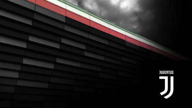 The Juventus logo appears on a black wall with a dark cloudy sky above, HD Desktop Wallpaper