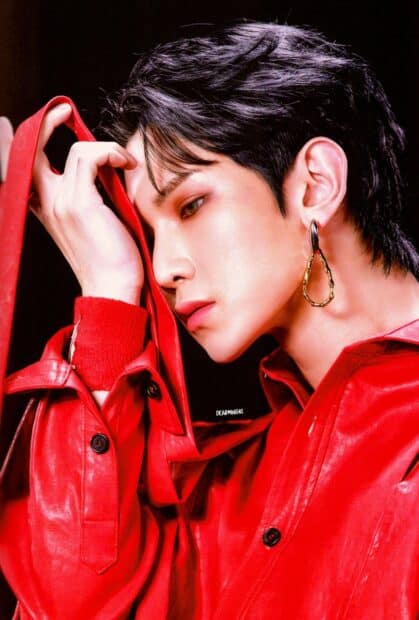 Kang Yeo Sang poses wearing a red jacket and unique earring, HD Phone Wallpaper