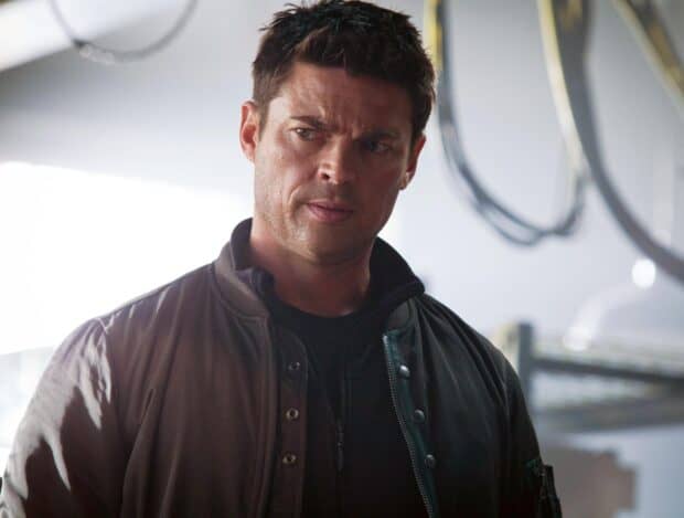 Karl Urban looks thoughtful in a dramatic scene, HD Desktop Wallpaper