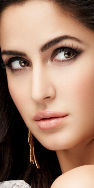 A close up portrait of Katrina Kaif showing her detailed facial features and makeup, HD Mobile Wallpaper