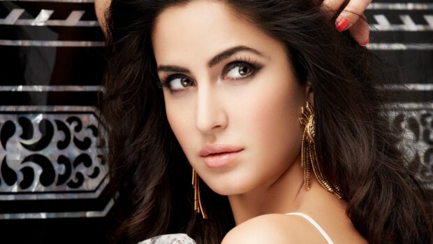 A close up portrait of Katrina Kaif with long hair and golden earrings, 4K Desktop Wallpaper