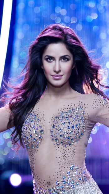 Katrina Kaif wears a sparkling embellished outfit with flowing hair and confident expression, HD Phone Wallpaper