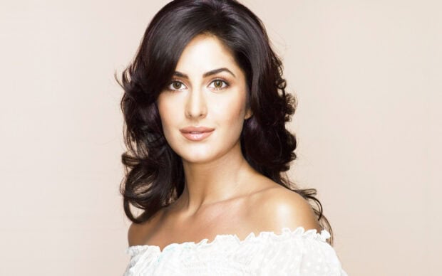 Katrina Kaif looks radiant in a white off shoulder dress with soft curls, 2K Desktop Wallpaper