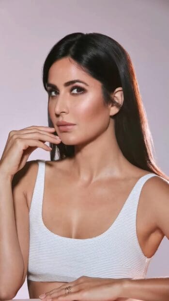 Katrina Kaif poses wearing a white top with a serene expression, 4K Mobile Wallpaper