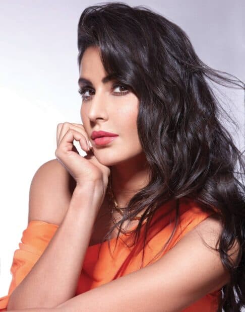 Katrina Kaif with flowing dark hair and soft makeup posing gracefully, HD Mobile Wallpaper