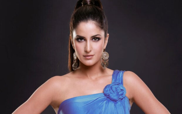 Katrina Kaif poses confidently wearing a blue dress and statement earrings, HD Desktop Wallpaper