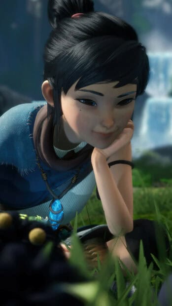 A close up of Kena from Kena Bridge Of Spirits smiling gently in a natural setting, 4K Phone Wallpaper