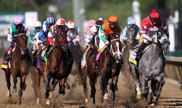 Jockeys compete in a Kentucky Derby race on lively track, 2K Desktop Wallpaper