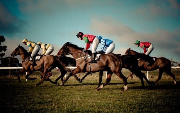 Jockeys riding horses during a Kentucky Derby race event, 2K Desktop Wallpaper