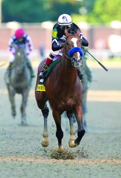 A jockey rides a horse in a competitive Kentucky Derby race on the dirt track, HD Mobile Wallpaper