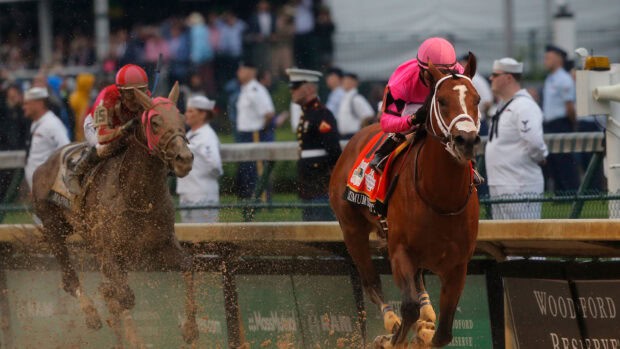 Two jockeys racing horses in the Kentucky Derby event, HD Desktop Wallpaper