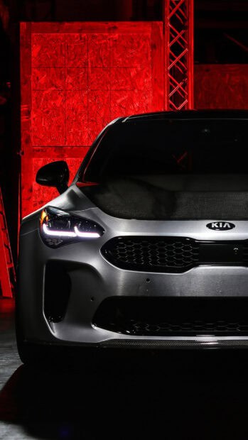 A silver Kia Stinger with illuminated headlights in a low light environment, 4K Mobile Wallpaper