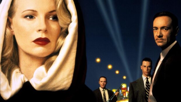 Kim Basinger appears with three men in suits under night lights, HD Desktop Wallpaper