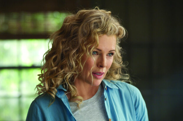 Kim Basinger looks thoughtfully in this close up portrait with natural curls, HD Desktop Wallpaper