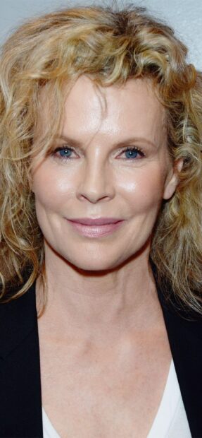 Kim Basinger wallpapers featuring a close up of her face with curly blonde hair and blue eyes, 2K Mobile Wallpaper