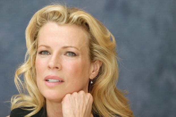 Kim Basinger wallpapers show her with blonde hair and a pensive look, 2K PC Wallpaper