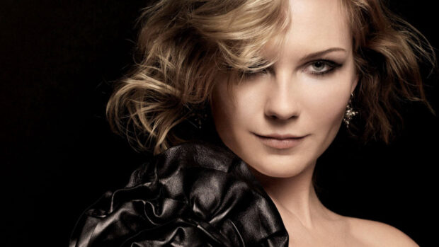 Kirsten Dunst wears a black leather garment with styled blonde hair, HD Desktop Wallpaper