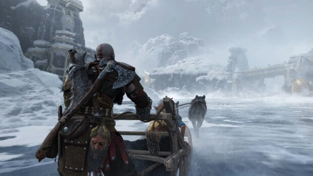 Kratos pulls a sleigh through the frozen wilderness in God Of War Ragnarok, 4K Desktop Wallpaper