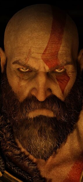 Kratos stares fiercely showing his iconic red tattoo and beard in God Of War Wallpapers, HD Phone Wallpaper
