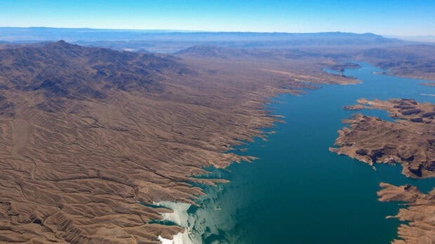 The aerial view shows the vast Lake Mead surrounded by arid mountains, 2K Desktop Wallpaper