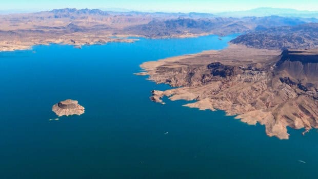 The aerial view captures the vast expanse of Lake Mead and surrounding desert hills, 2K Desktop Wallpaper