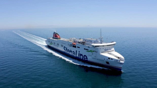 A large ferry sailing smoothly on calm blue ocean waters during the day, HD Desktop Wallpaper