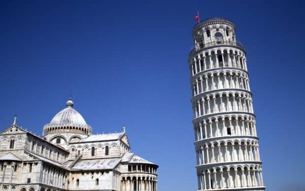 The leaning Tower of Pisa stands beside an ancient cathedral with a bright blue sky in the background, HD Desktop Wallpaper