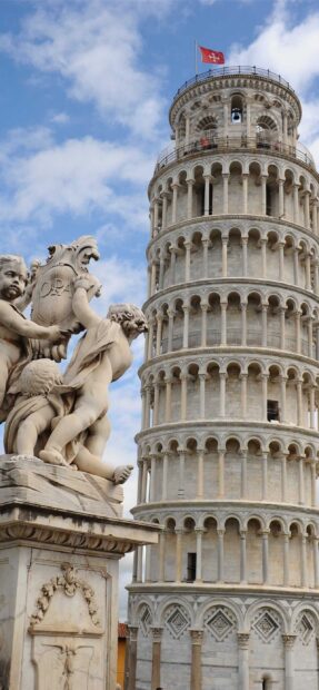The Tower of Pisa stands beside a cherub statue under a partly cloudy sky, 2K Phone Wallpaper