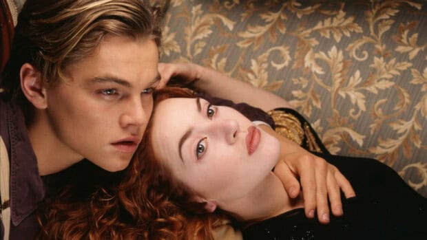 Leonardo Dicaprio is resting close to a woman with red hair against patterned wallpaper, HD Desktop Wallpaper