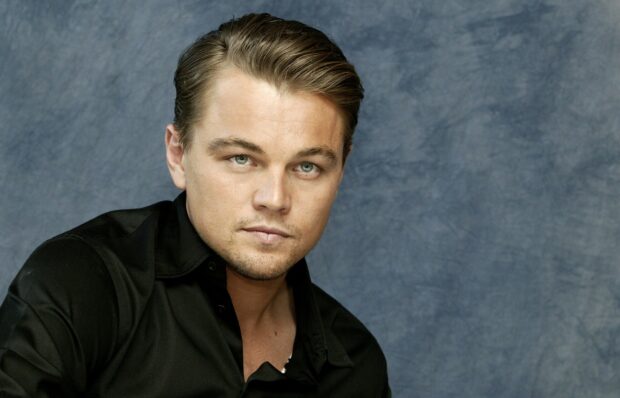 Leonardo Dicaprio looks directly at the camera with a calm expression, HD Desktop Wallpaper