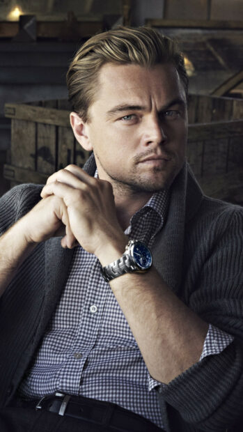 Leonardo Dicaprio shown wearing a watch and casual clothing while seated indoors, HD Phone Wallpaper