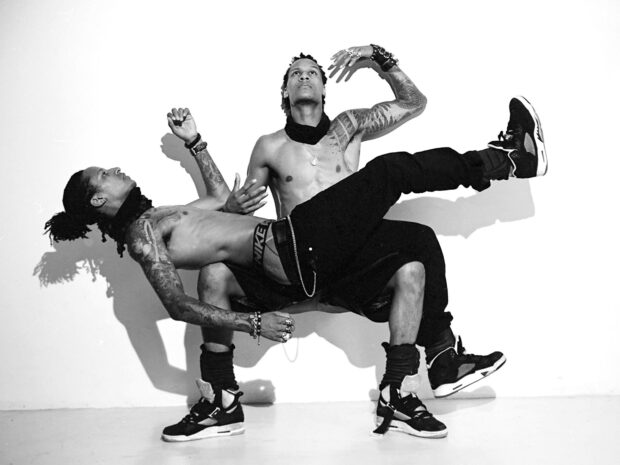 Les Twins display a synchronized dance pose showcasing their unique style and energy, HD Desktop Wallpaper