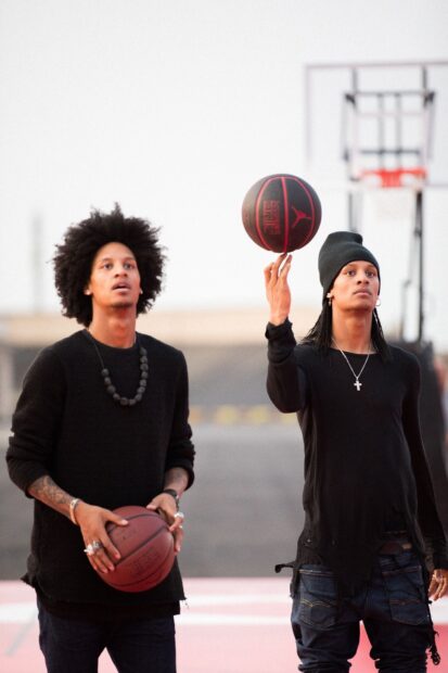 The Les Twins are practicing basketball on an outdoor court, HD Mobile Wallpaper